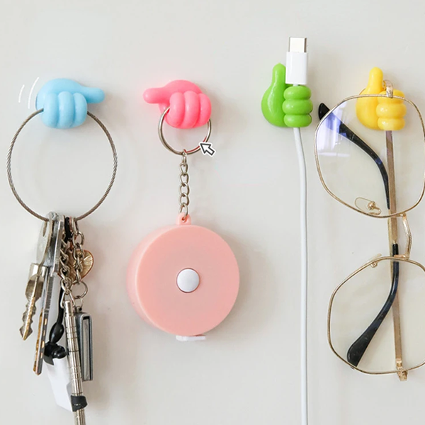Soporte Multifuncional con forma de Pulgar (Pack de 10 unidades)